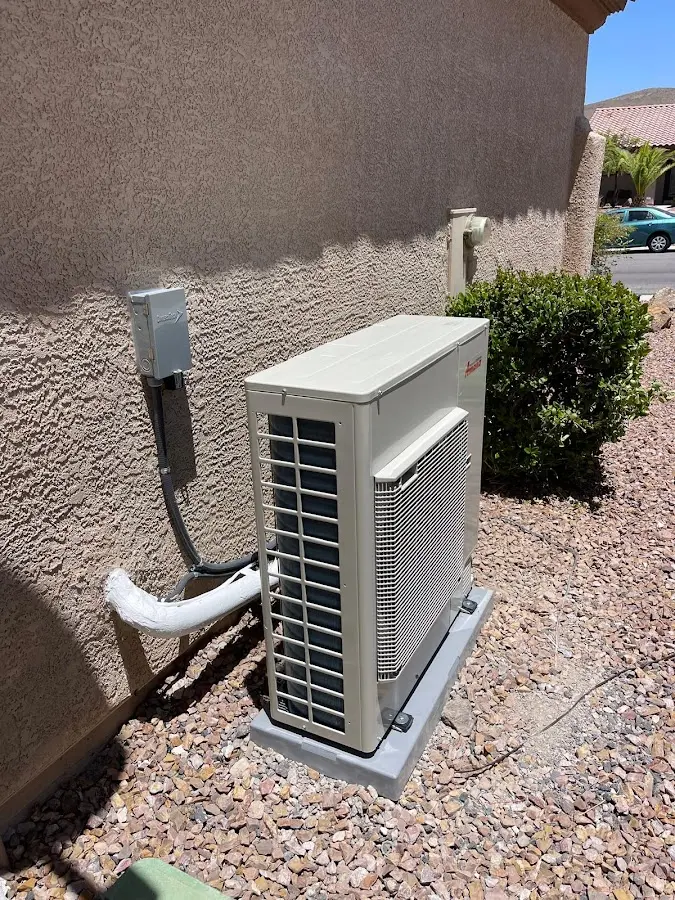 Residential air conditioning condenser unit in Garfield
